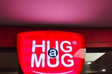 Hug a Mug Café Kozhikode interior at HiLITE City coffee shop